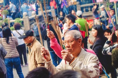Worshiper inside Longshan Temple in Taipei
