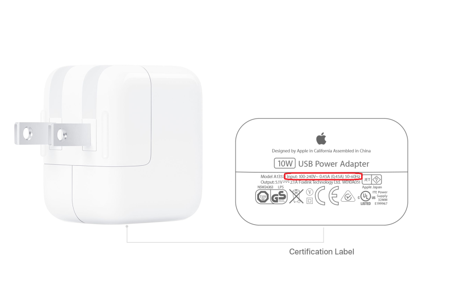 apple 10w power adapter specification label showing dual-voltage